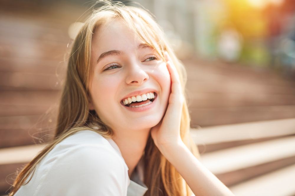 Patient smiling during dental checkup – Ideal Dental Houston TX