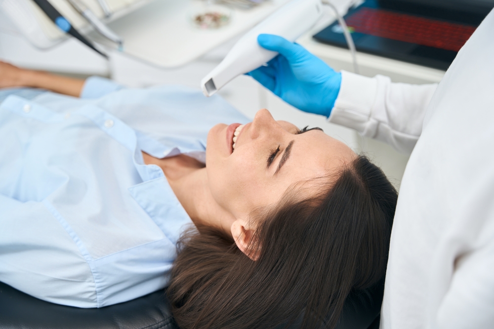 Dr. Chiara Combs, DDS smiling in dental office – Ideal Smiles Family Dentistry