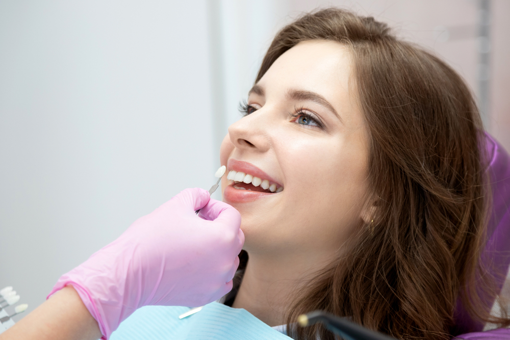 Patient smiling during dental checkup – Ideal Dental Houston TX
