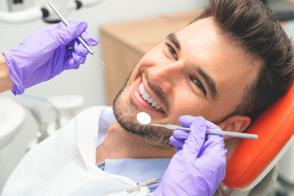 Dr. Chiara Combs, DDS smiling in dental office – Ideal Smiles Family Dentistry