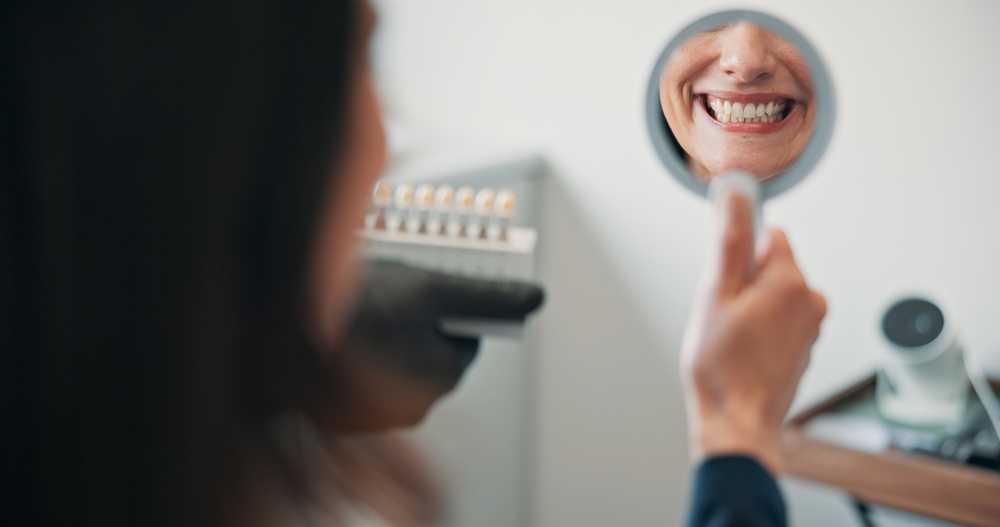 Dr. Chiara Combs, DDS smiling in dental office – Ideal Smiles Family Dentistry