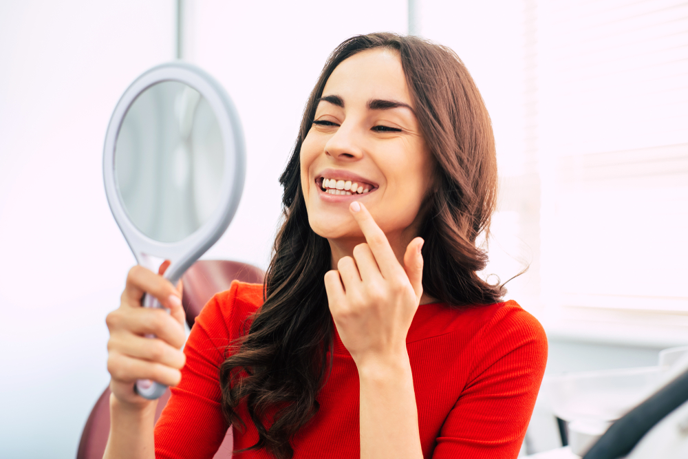 Patient smiling during dental checkup – Ideal Dental Houston TX