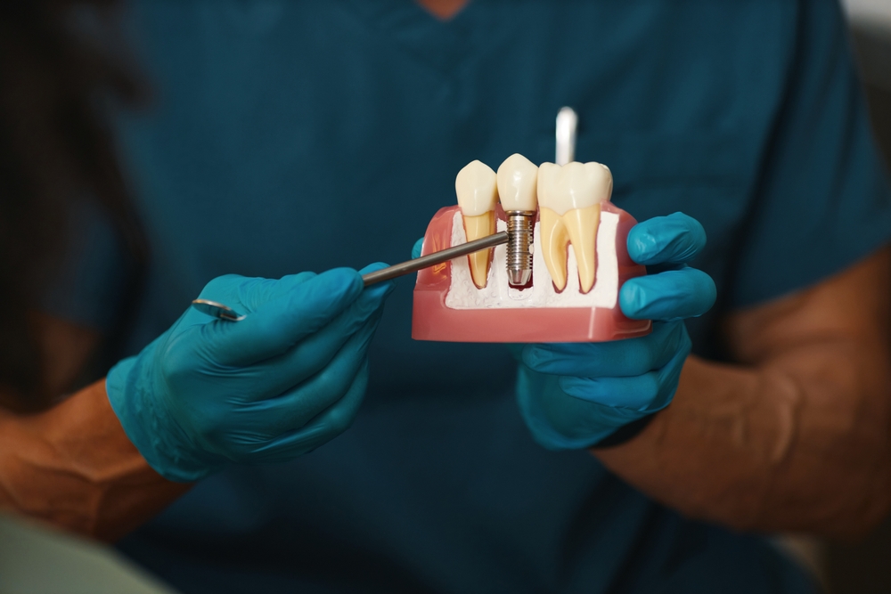 Patient smiling during dental checkup – Ideal Dental Houston TX
