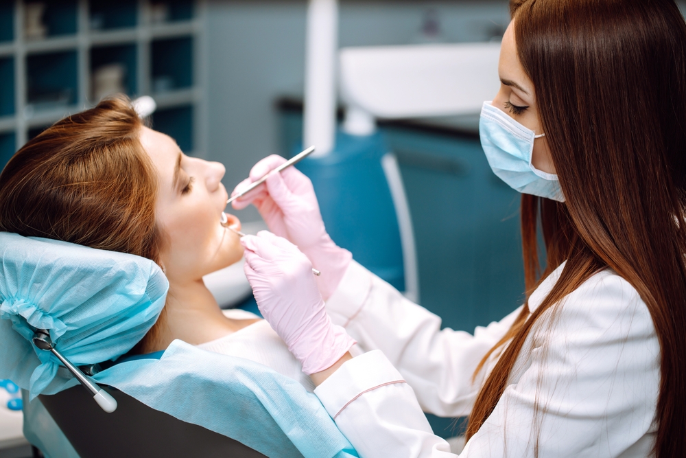 Dr. Chiara Combs, DDS smiling in dental office – Ideal Smiles Family Dentistry
