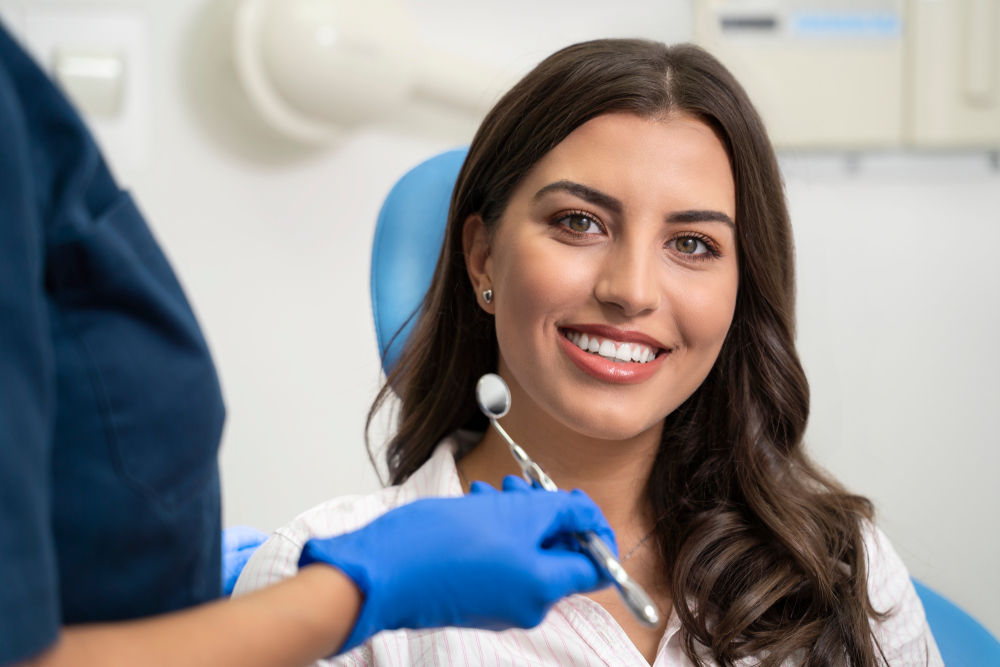 Dr. Chiara Combs, DDS smiling in dental office – Ideal Smiles Family Dentistry